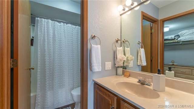 2500 Bay Point Ln Unit 645, Osage Beach, MO 65065 - full bathroom with toilet and vanity