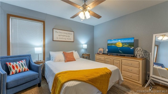 2500 Bay Point Ln Unit 645, Osage Beach, MO 65065 - bedroom with carpet and a ceiling fan