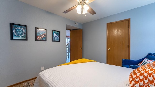2500 Bay Point Ln Unit 645, Osage Beach, MO 65065 - carpeted bedroom featuring a ceiling fan and baseboards