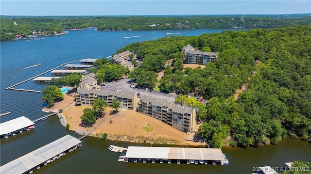 2500 Bay Point Ln Unit 645, Osage Beach, MO 65065 - drone / aerial view of a heavily wooded area and a large body of water