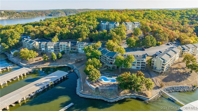 2500 Bay Point Ln Unit 645, Osage Beach, MO 65065 - aerial view of apartment complex, a forest, and a nearby body of water