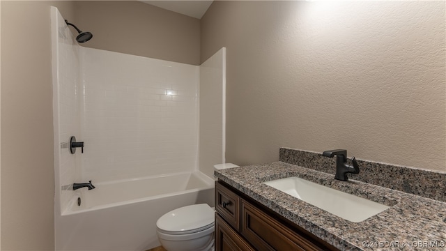 full bathroom featuring shower / tub combination, vanity, and toilet