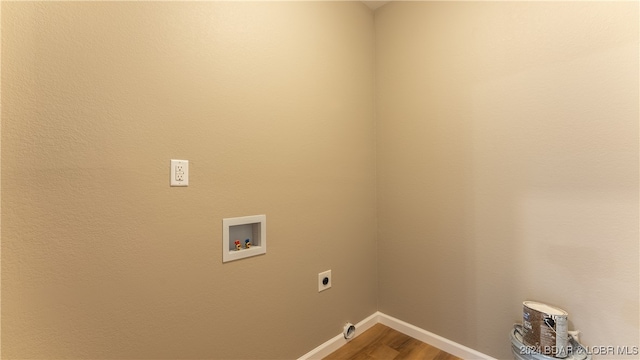 laundry area with washer hookup, hardwood / wood-style flooring, and electric dryer hookup