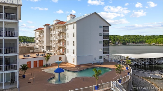 view of building exterior featuring a water view