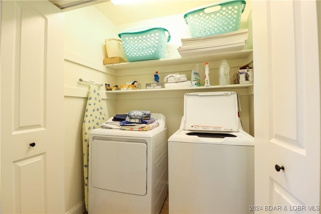 laundry area with washer and dryer