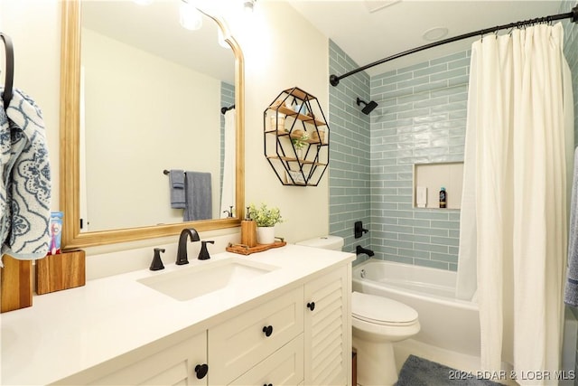 full bathroom with vanity, toilet, and shower / bath combo with shower curtain