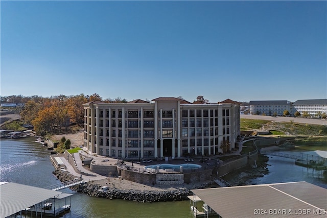 view of building exterior featuring a water view