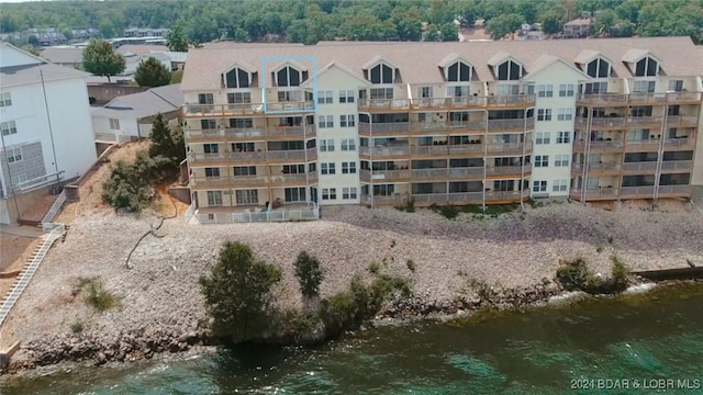 view of building exterior featuring a water view