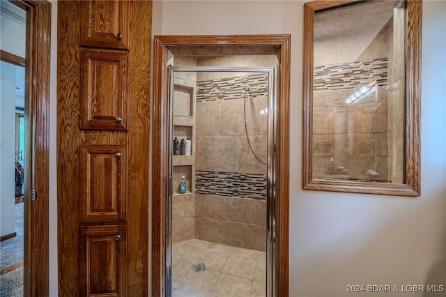 bathroom with a shower with shower door