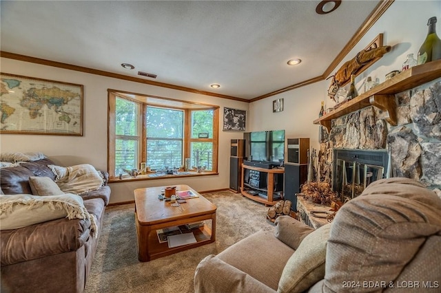 carpeted living room with ornamental molding, a stone fireplace, visible vents, and baseboards