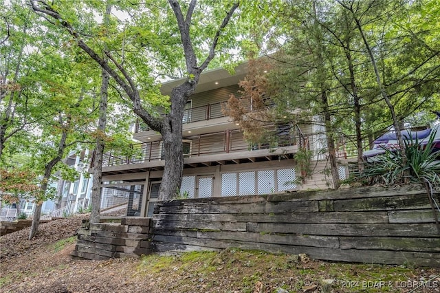 back of property with stairs