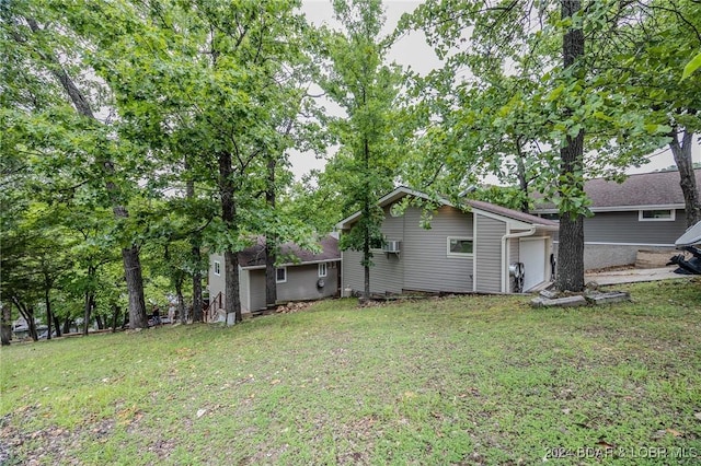 view of yard with a garage