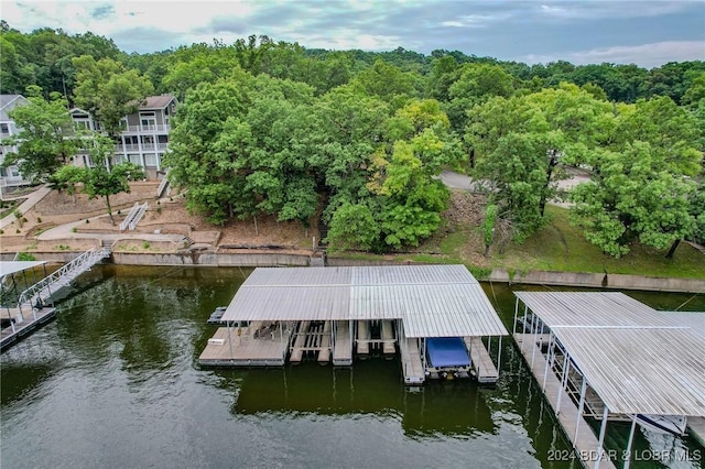 view of dock featuring a water view and boat lift