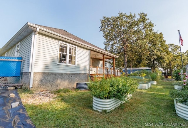 view of home's exterior with a lawn