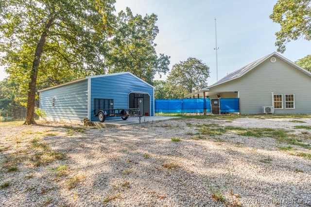 exterior space featuring a carport