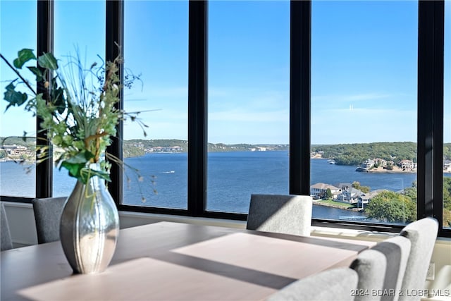 dining room with a water view