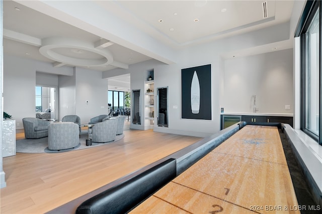 playroom featuring a wealth of natural light and wood-type flooring