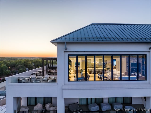 view of property exterior at dusk