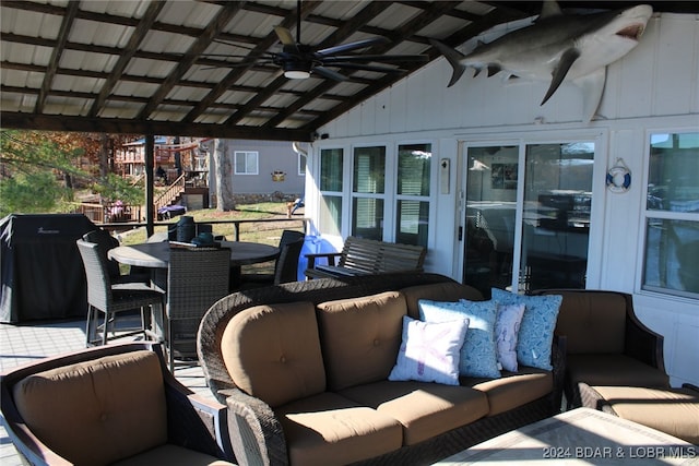 view of patio / terrace featuring a grill, ceiling fan, and an outdoor living space