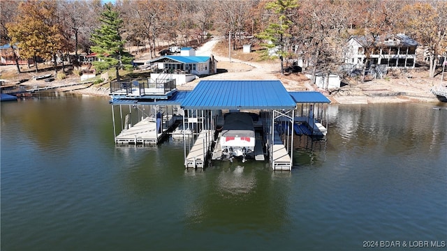 dock area featuring a water view