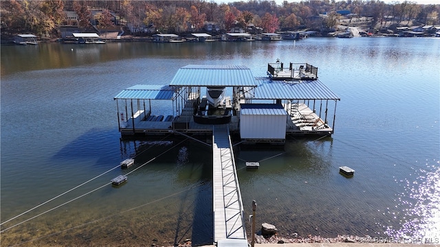 dock area featuring a water view