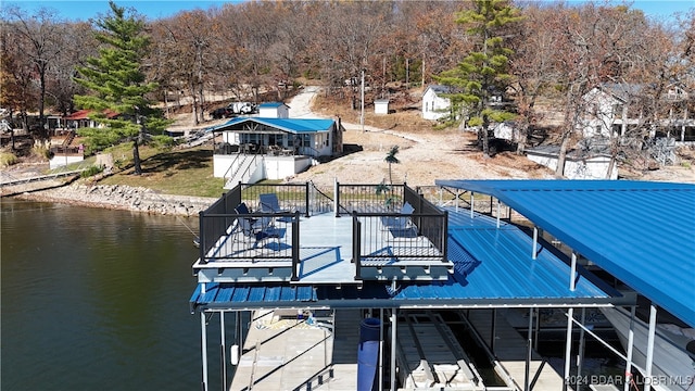 dock area with a water view