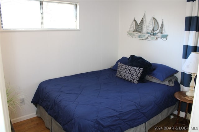 bedroom featuring hardwood / wood-style floors