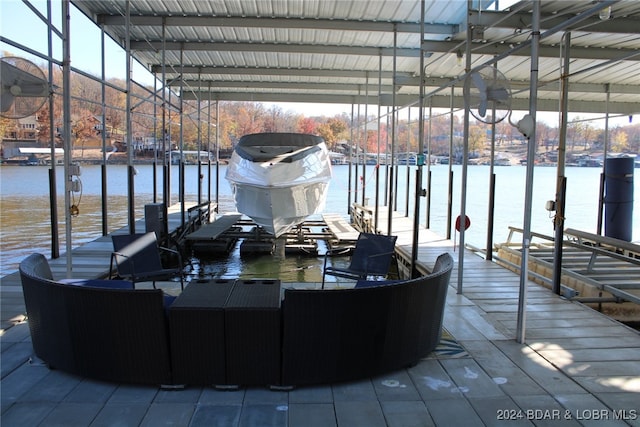 view of dock with a water view