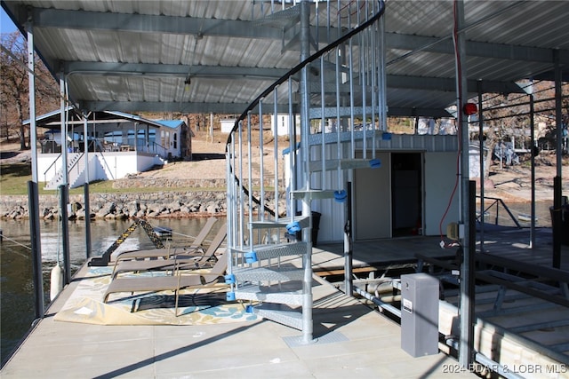 dock area with a water view