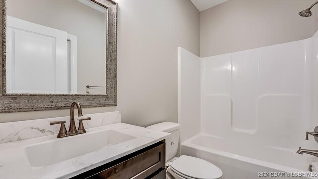 LOT1014 Enclaves Ln, Lake Ozark, MO 65049 - full bathroom featuring toilet, vanity, and shower / tub combination