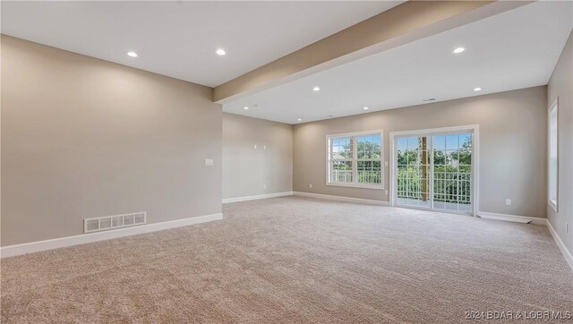 LOT1014 Enclaves Ln, Lake Ozark, MO 65049 - spare room featuring light colored carpet, recessed lighting, and baseboards
