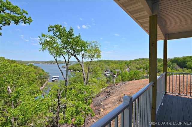 LOT1014 Enclaves Ln, Lake Ozark, MO 65049 - wooden terrace featuring a water view and a wooded view