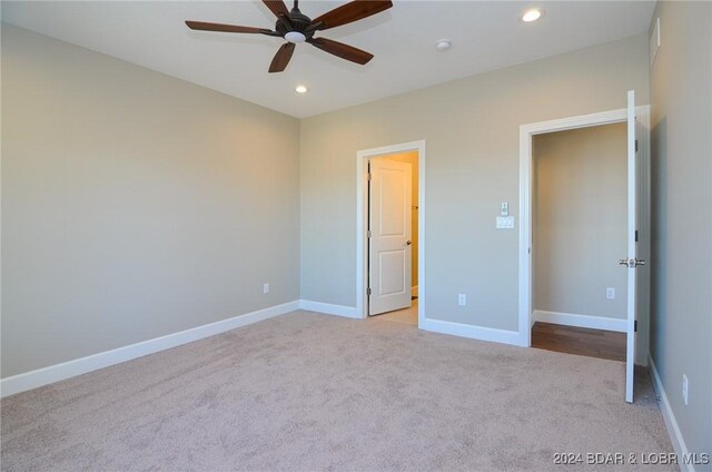 LOT1014 Enclaves Ln, Lake Ozark, MO 65049 - unfurnished bedroom featuring carpet flooring, recessed lighting, baseboards, and a ceiling fan