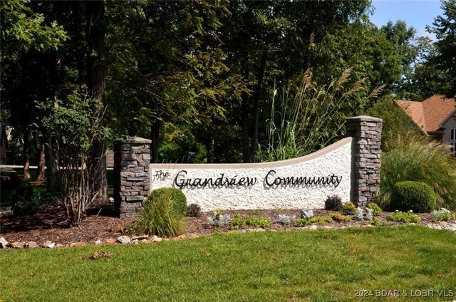 LOT1014 Enclaves Ln, Lake Ozark, MO 65049 - community / neighborhood sign featuring a lawn