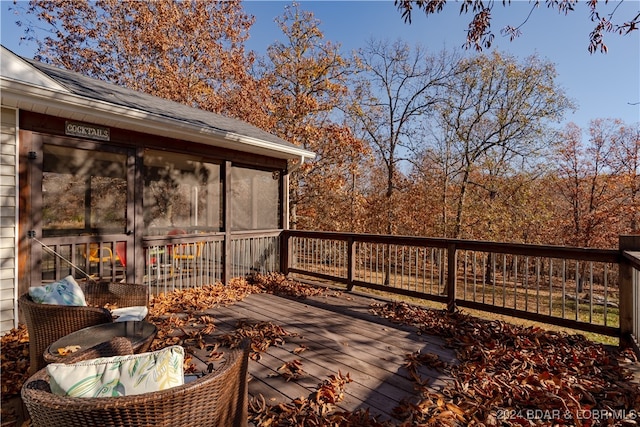 deck with a sunroom