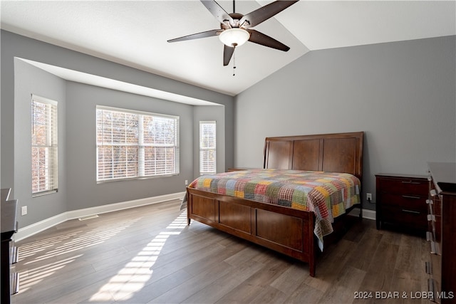 bedroom featuring ceiling fan, vaulted ceiling, and hardwood / wood-style flooring