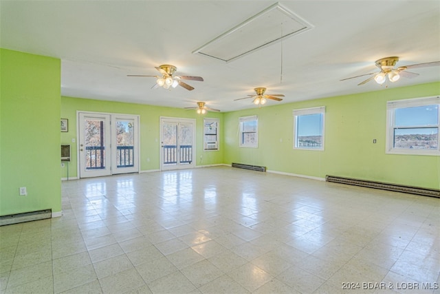 unfurnished room with a baseboard radiator