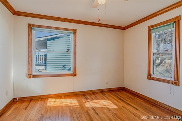 unfurnished room featuring crown molding, ceiling fan, and light hardwood / wood-style floors