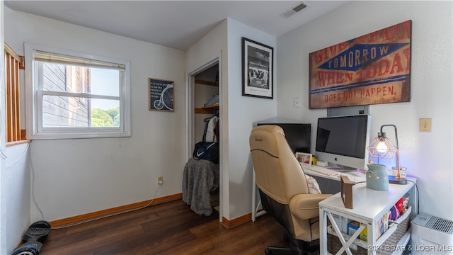 office with dark wood-type flooring