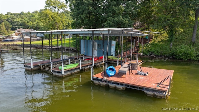 view of dock with a water view