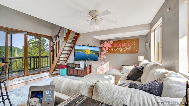 living room with ceiling fan