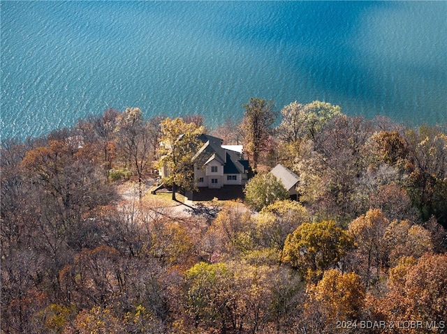 drone / aerial view with a water view