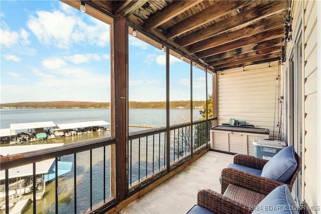 sunroom with a water view