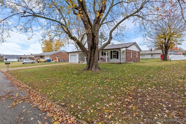 ranch-style house featuring brick siding, a porch, a front yard, a garage, and a residential view