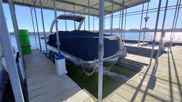 view of dock with a water view