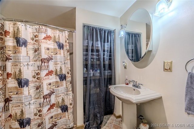 bathroom with a shower with curtain