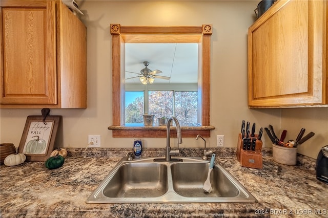 kitchen with ceiling fan and sink