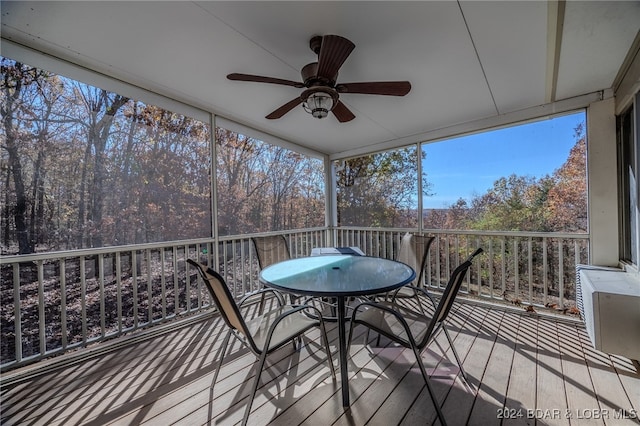 wooden deck with ceiling fan