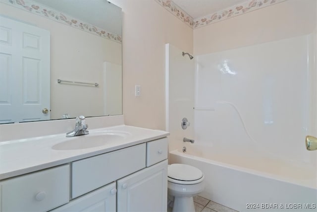 full bathroom featuring tile patterned floors, vanity, toilet, and shower / bathtub combination