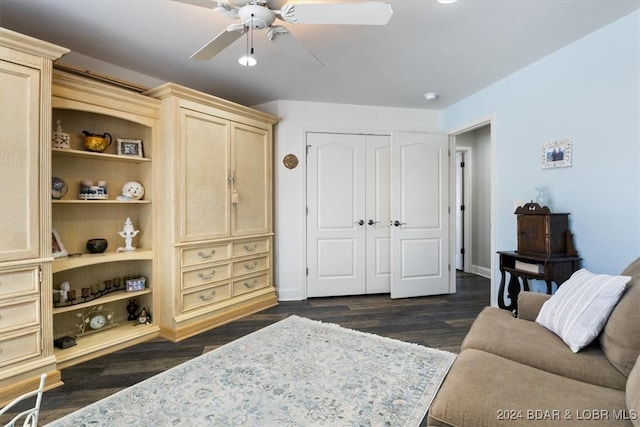 bedroom featuring a closet, ceiling fan, and dark wood-type flooring